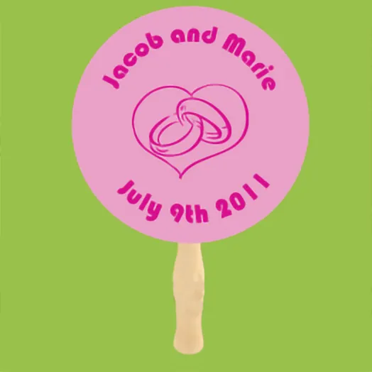 Round pink fan with wedding rings inside a heart, Jacob and Marie, and July 9th 2011