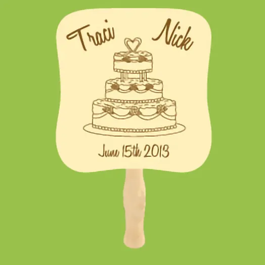 Cream fan with a brown tiered wedding cake between Traci and Nick